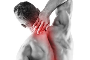 muscular-man-with-pain-in-his-neck-picture-id1016636228
