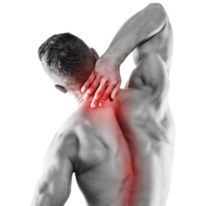Muscular man with pain in his neck over white background