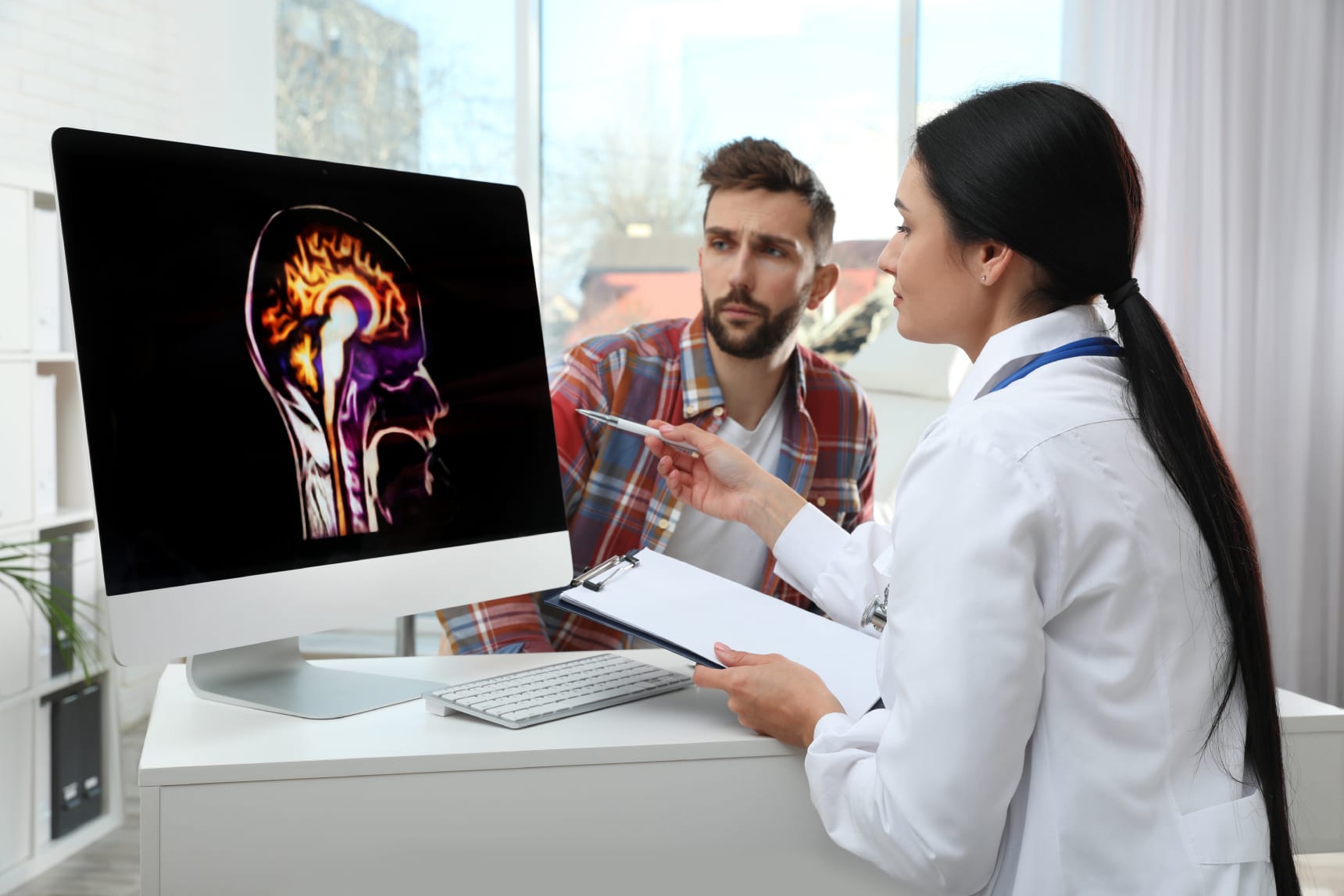 Patient meeting with doctor to discuss brain tumor